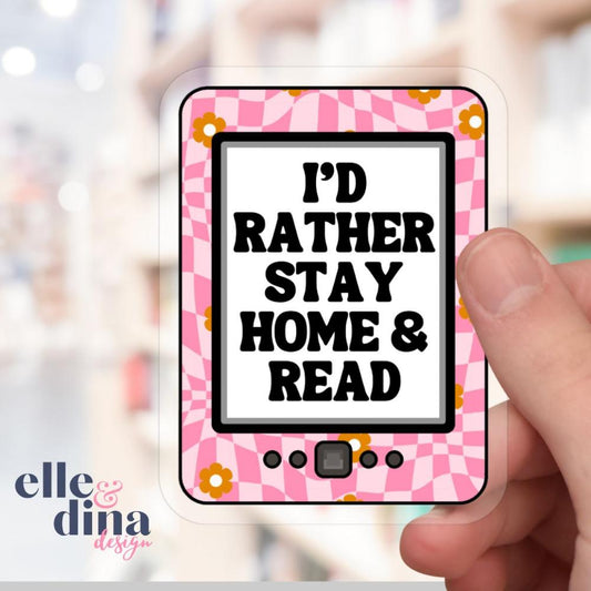 sticker of a kindle with retro pink wavy checkerboard pattern with orange daisies and the text I'd rather stay home and read